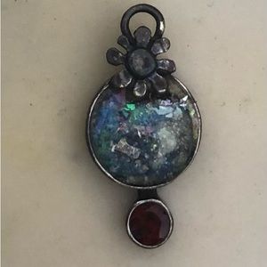 Roman glass charm from Israel, silver